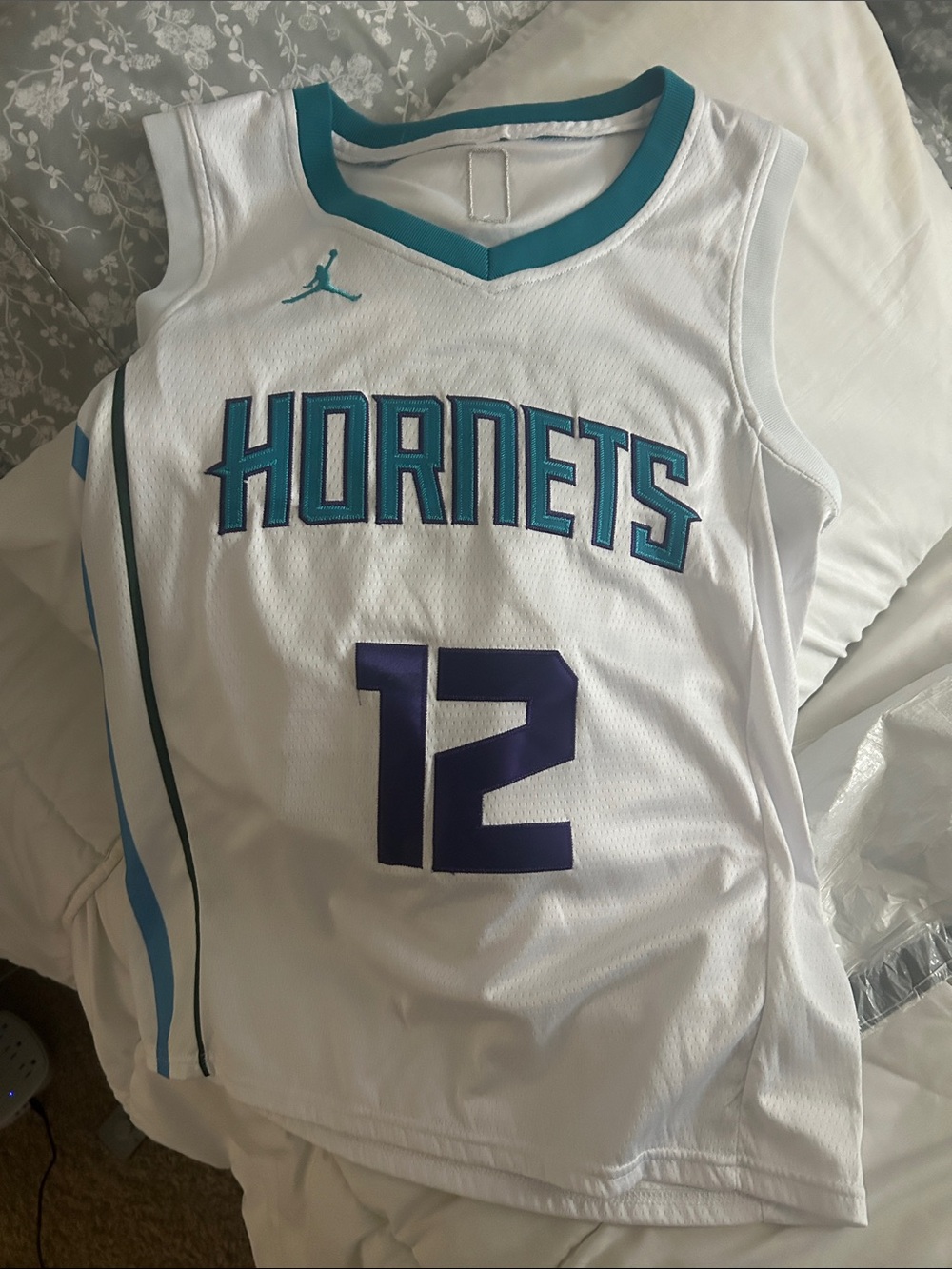 Jordan White Basketball Jersey with Teal and Purple Accents